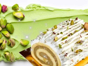 sfondo colata di pistacchio e pistacchi, rotolone pistacchioso e brillantini