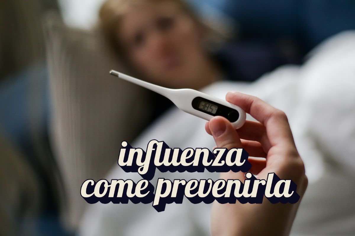 Termometro e scritta "influenza come prevenirla"